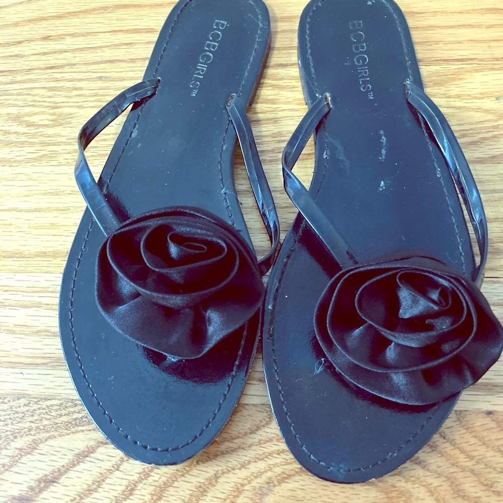 BCB  Flip Flops  with a flower in the front